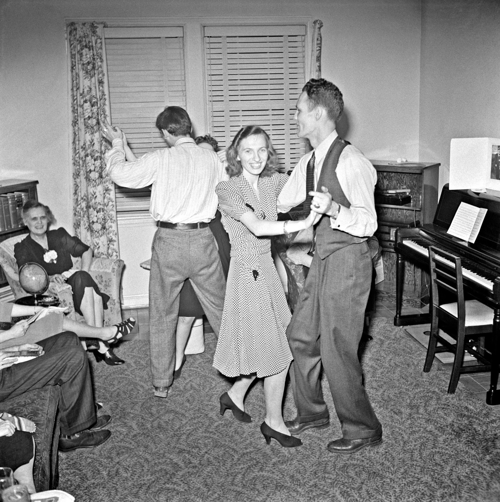 Guests dancing at a Christmas gathering in 1941