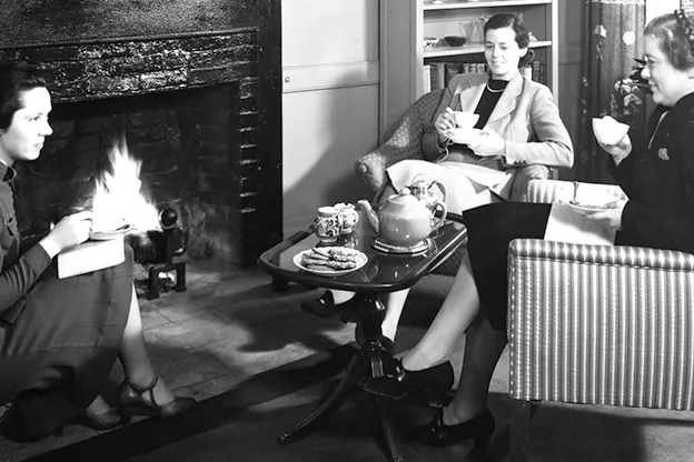 A relaxed fireside tea gathering in 1937