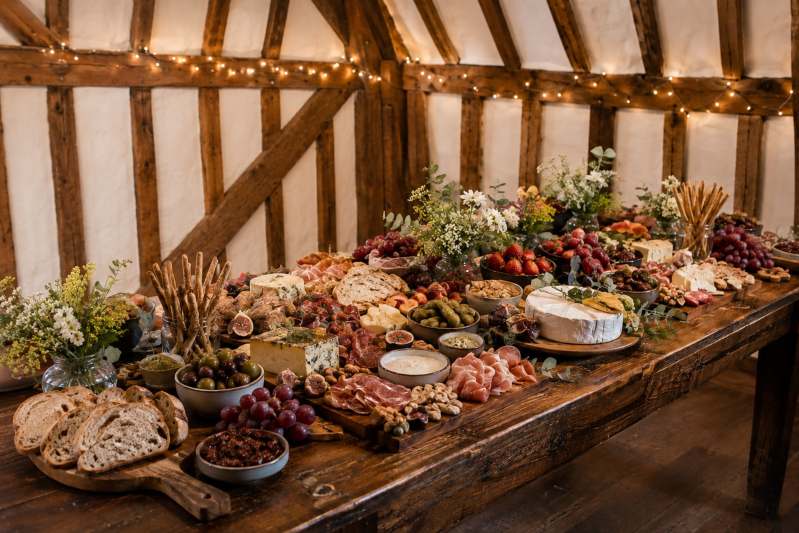 Generous grazing food served beneath the barn beams