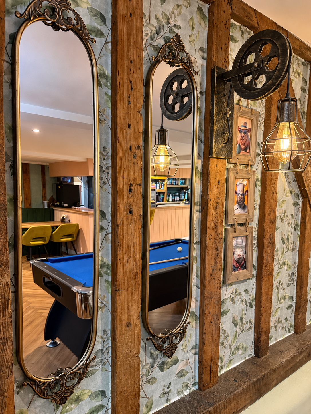 Antique mirrors reflecting the pub pool table